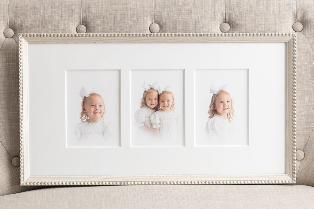 Frame with three fine art matted heirloom prints of two sisters in heirloom dresses in Savannah, GA.