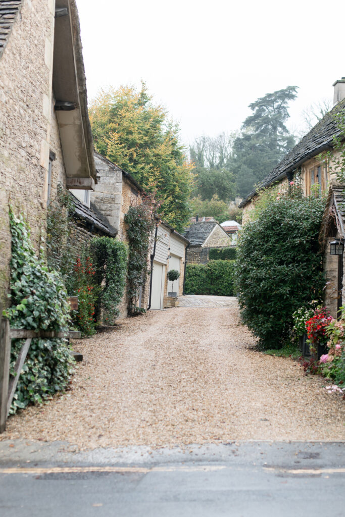 Looking down an alley way of old stone building 