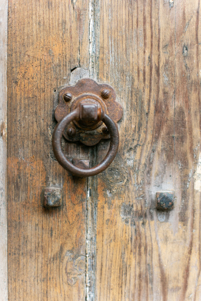 The door pull on an old entrance door.