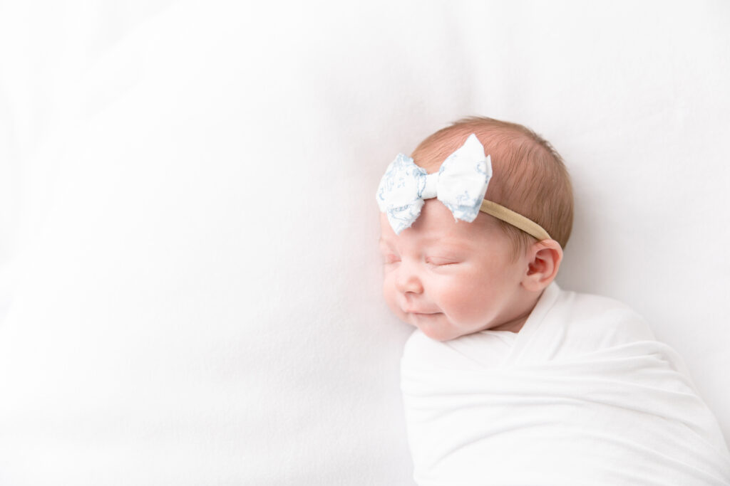 Newborn baby girl at an in-studio session in Savannah, Georgia with Savannah maternity photographer, Tiffany Bradley.