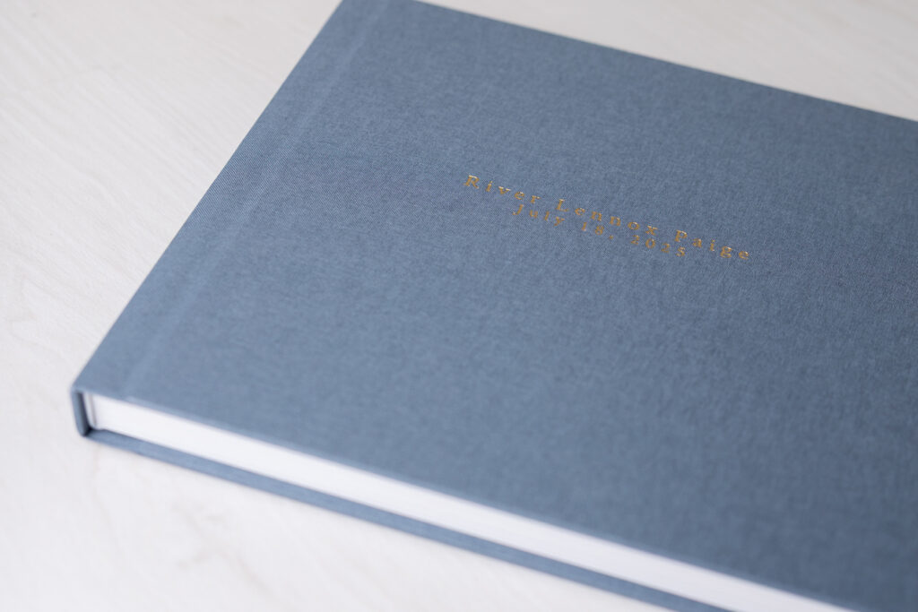 A close up of an heirloom album designed and created by Tiffany Bradley, Savannah newborn photographer. 