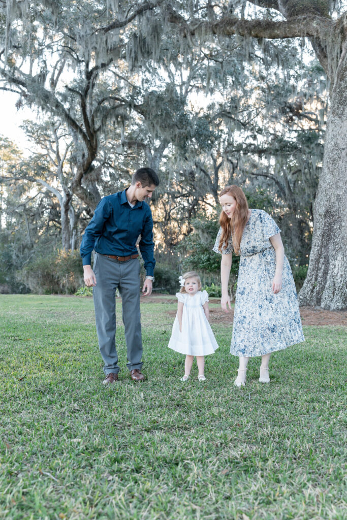 Family of three during a fall session at HollyOaks on the Marsh with Savannah photographer Tiffany Bradley Photography.
