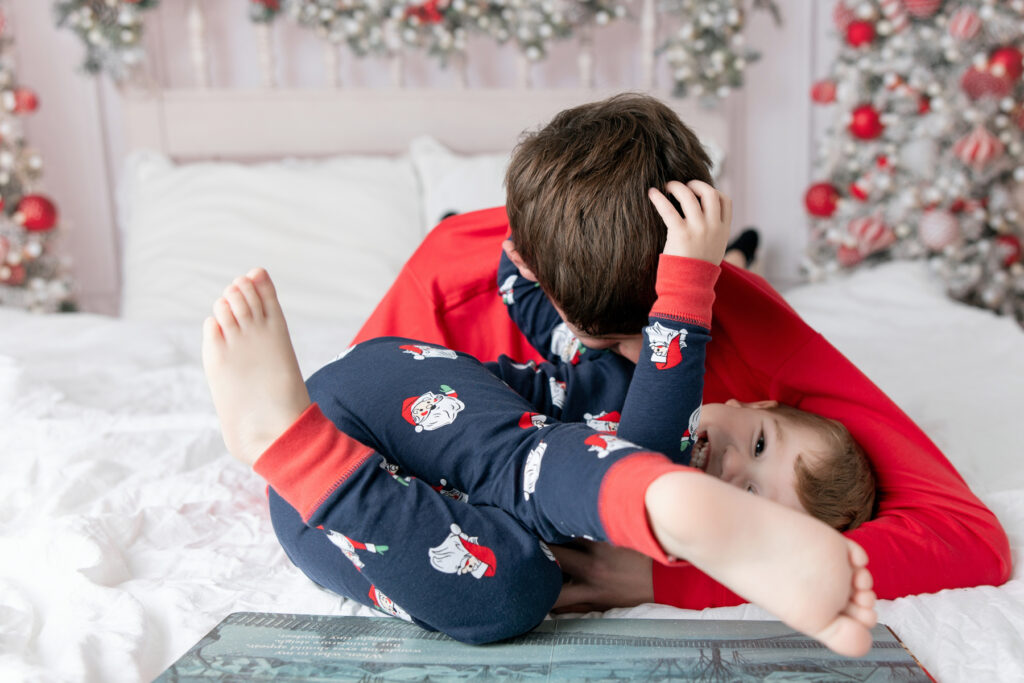 Christmas in Savannah, Jolly Jammies photo session with two brothers  at Tiffany Bradley Photography's Savannah studio. 