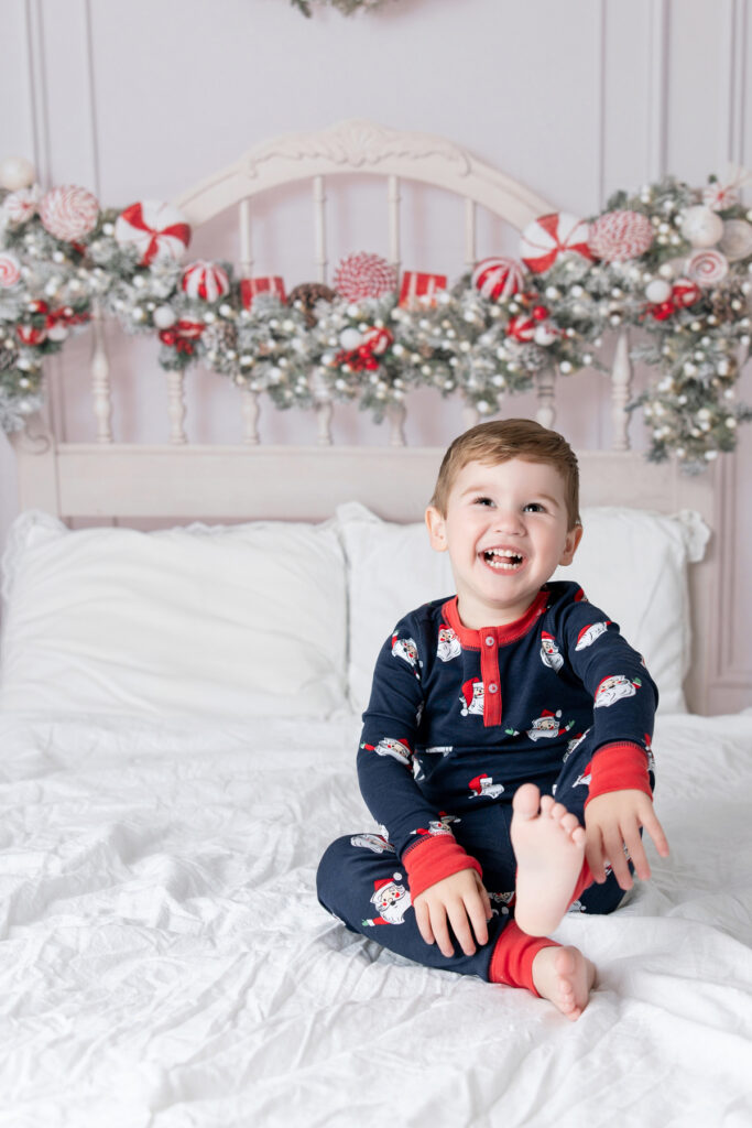 Jolly Jammies session with two brothers in their Beaufort Bonnet Christmas pajamas to celebrate Christmas in Savannah with a fun portrait session.