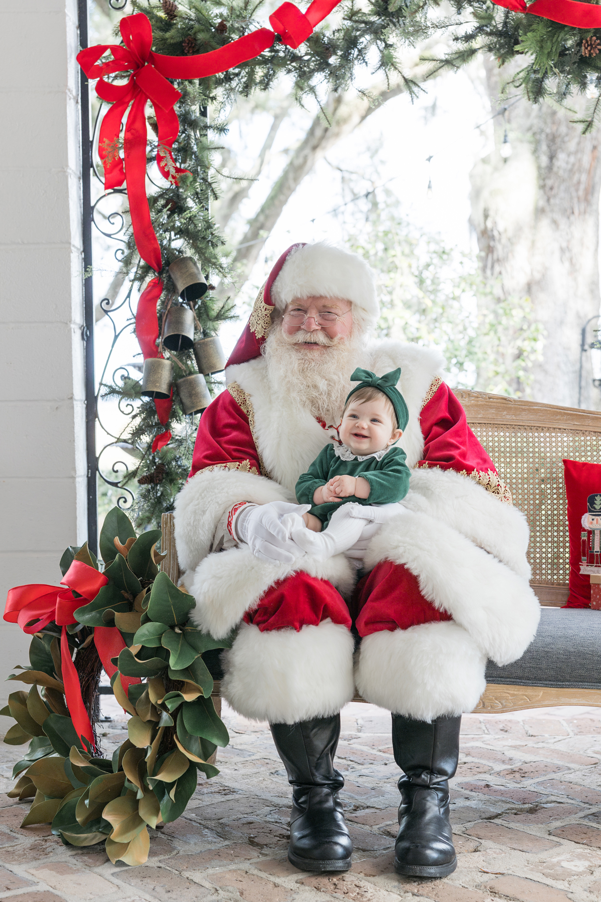 Baby girl’s first Santa pictures at HollyOaks on the Marsh in Savannah, GA.