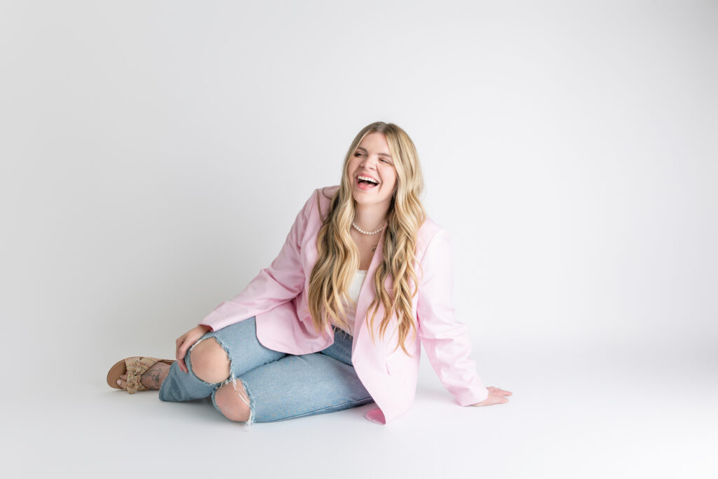 Savannah Smocks owner laughs during her branding session with Tiffany Bradley Photography in Savannah, GA. 