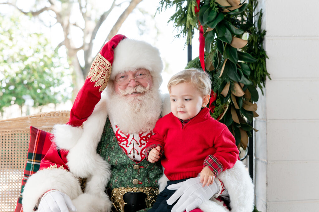 Candid moment of a child giving Santa side-eye during a Santa Savannah GA session