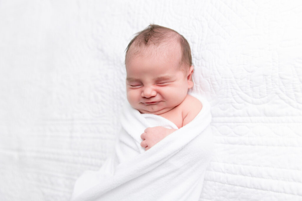 Close up detail photograph of a newborn baby capturing tiny features during a Savannah, GA newborn photography session.