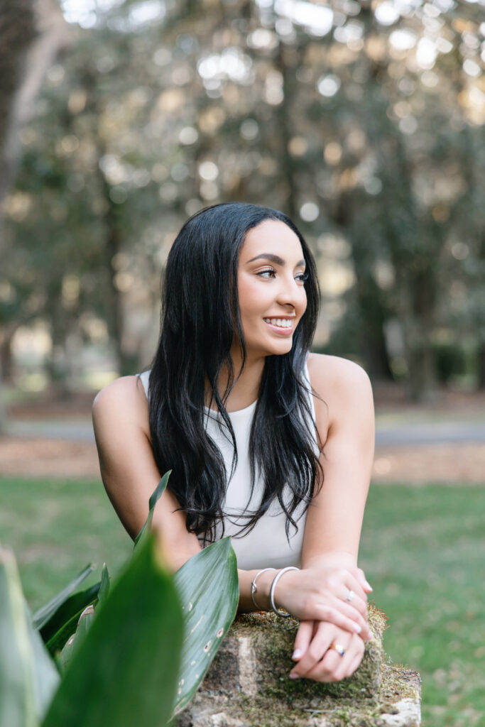 Profile shot of graduate during a portrait session with Tiffany Bradley Photography