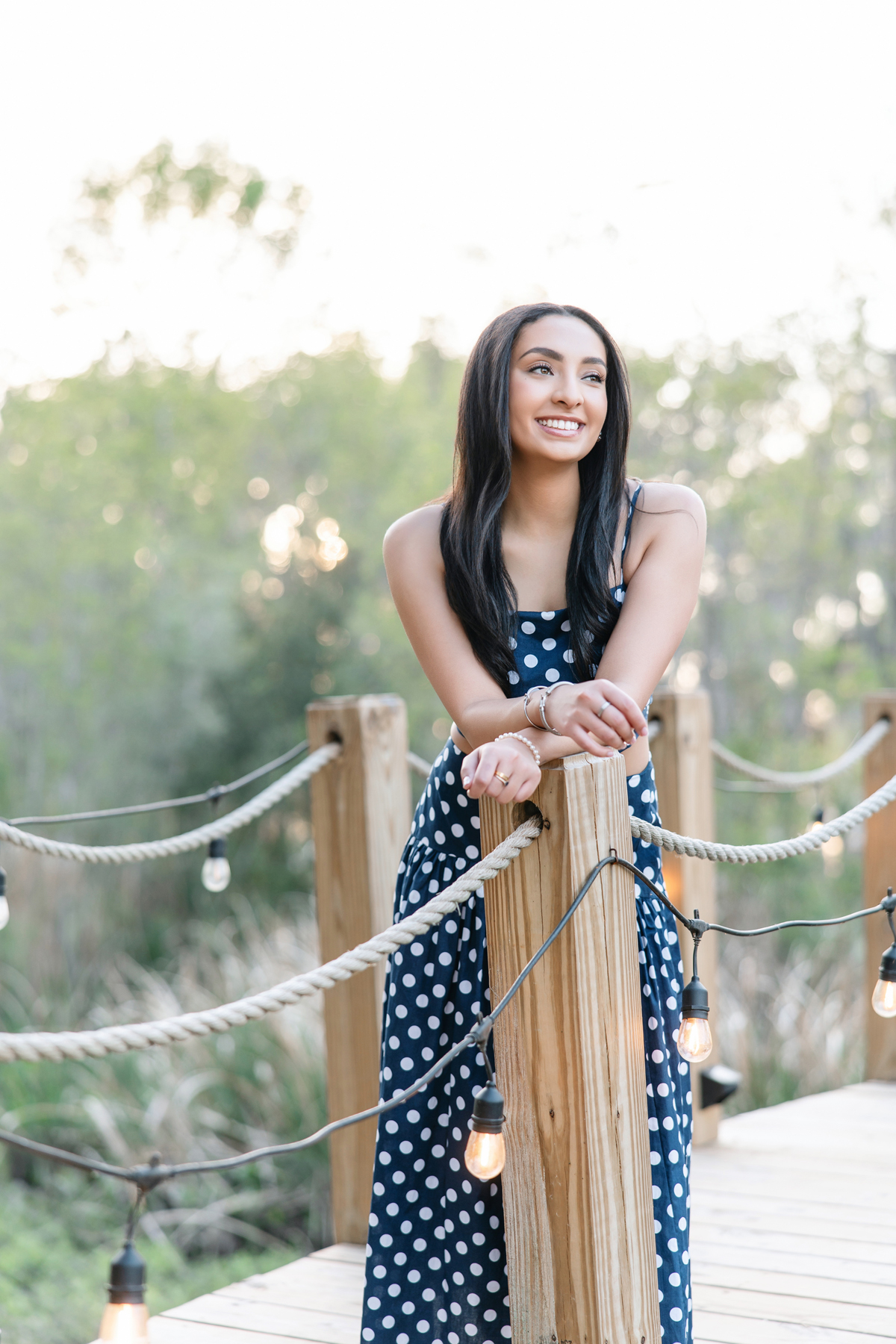Senior pictures for college graduate in Savannah with classic southern backdrop